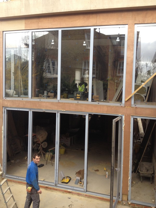 Aluminium bi-fold doors with two-storey glazing in Bracknell