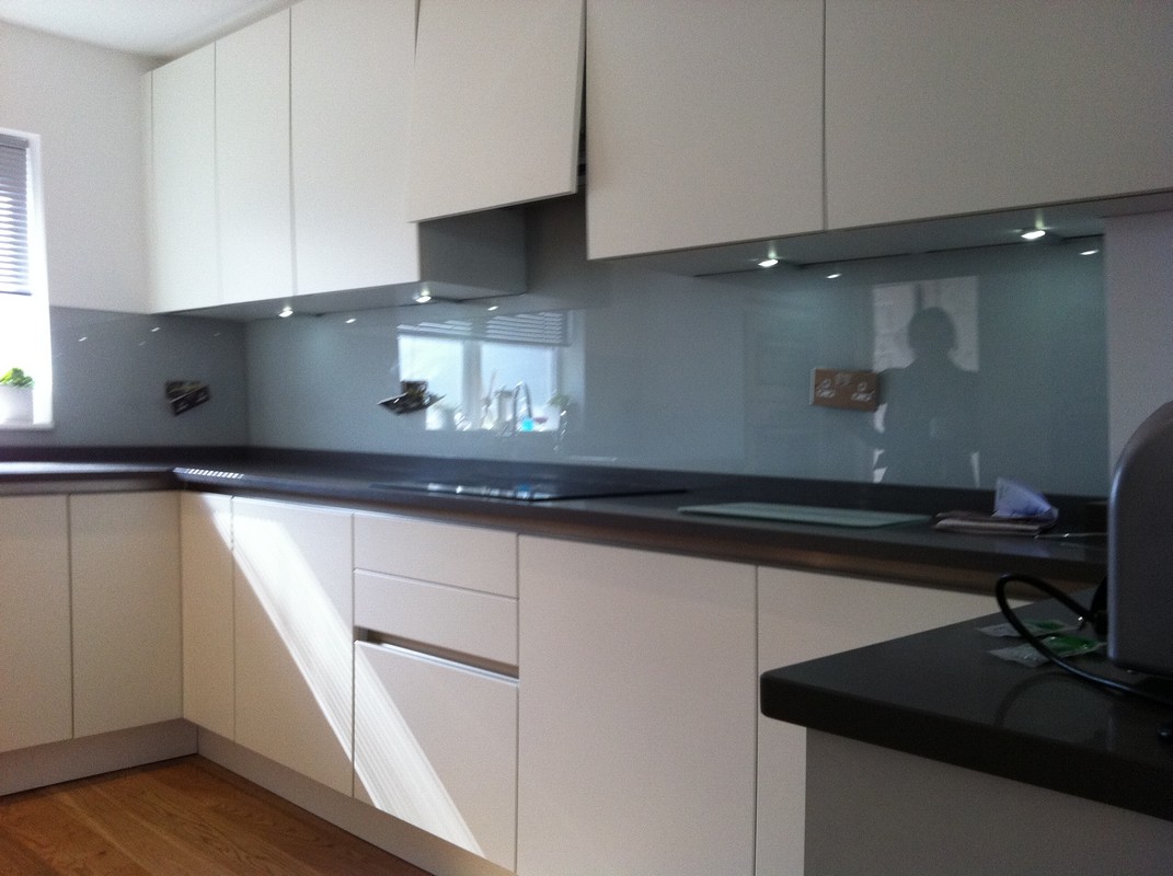 Grey glass kitchen splashback with LED lighting in Bracknell