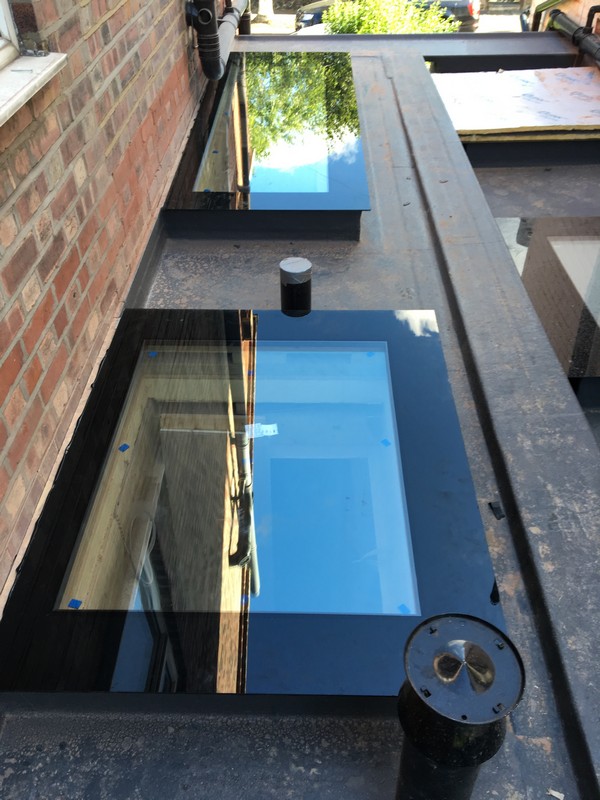 Multiple flat roof skylights on extension in Bracknell