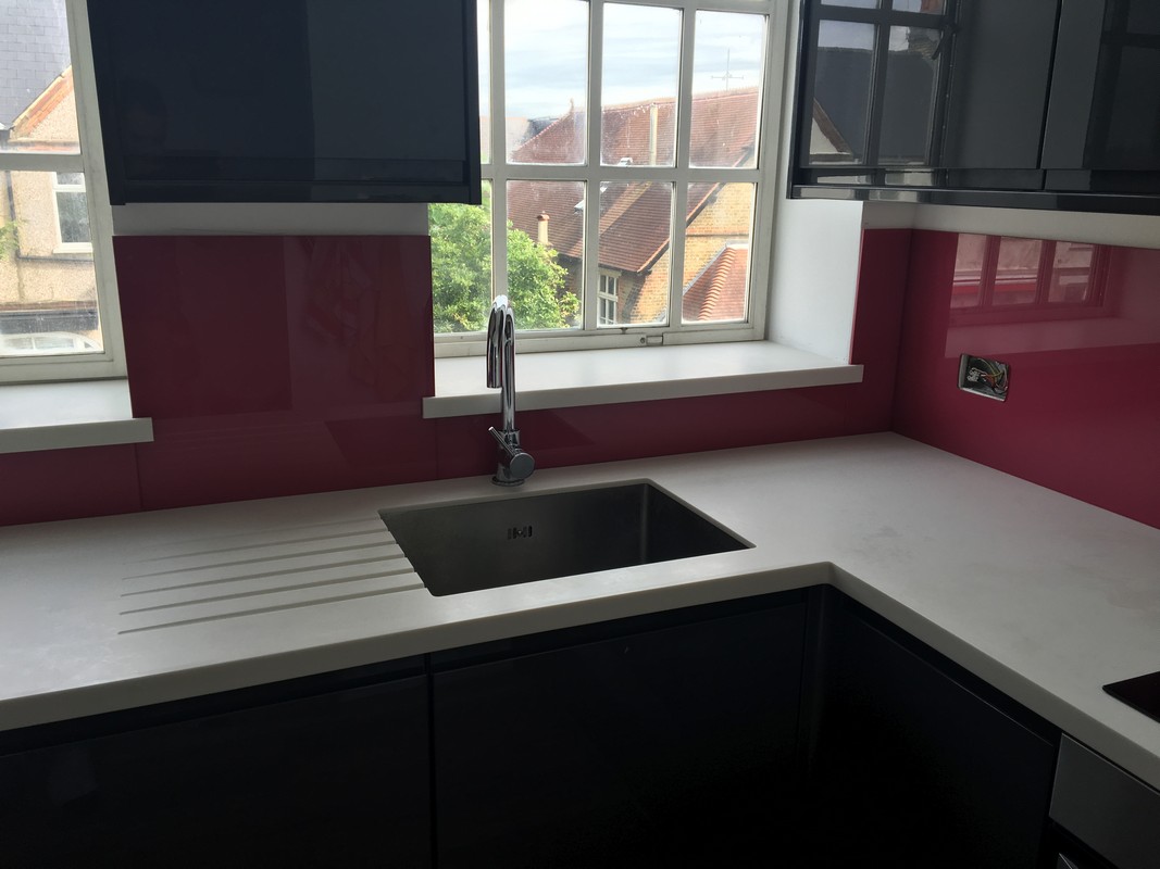 Deep plum coloured glass splashback in modern Bracknell kitchen