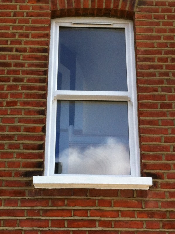 uPVC sash window on Victorian red brick house in Bracknell